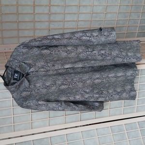 Long brown snake skin patterned women's raincoat with pockets 1990s style